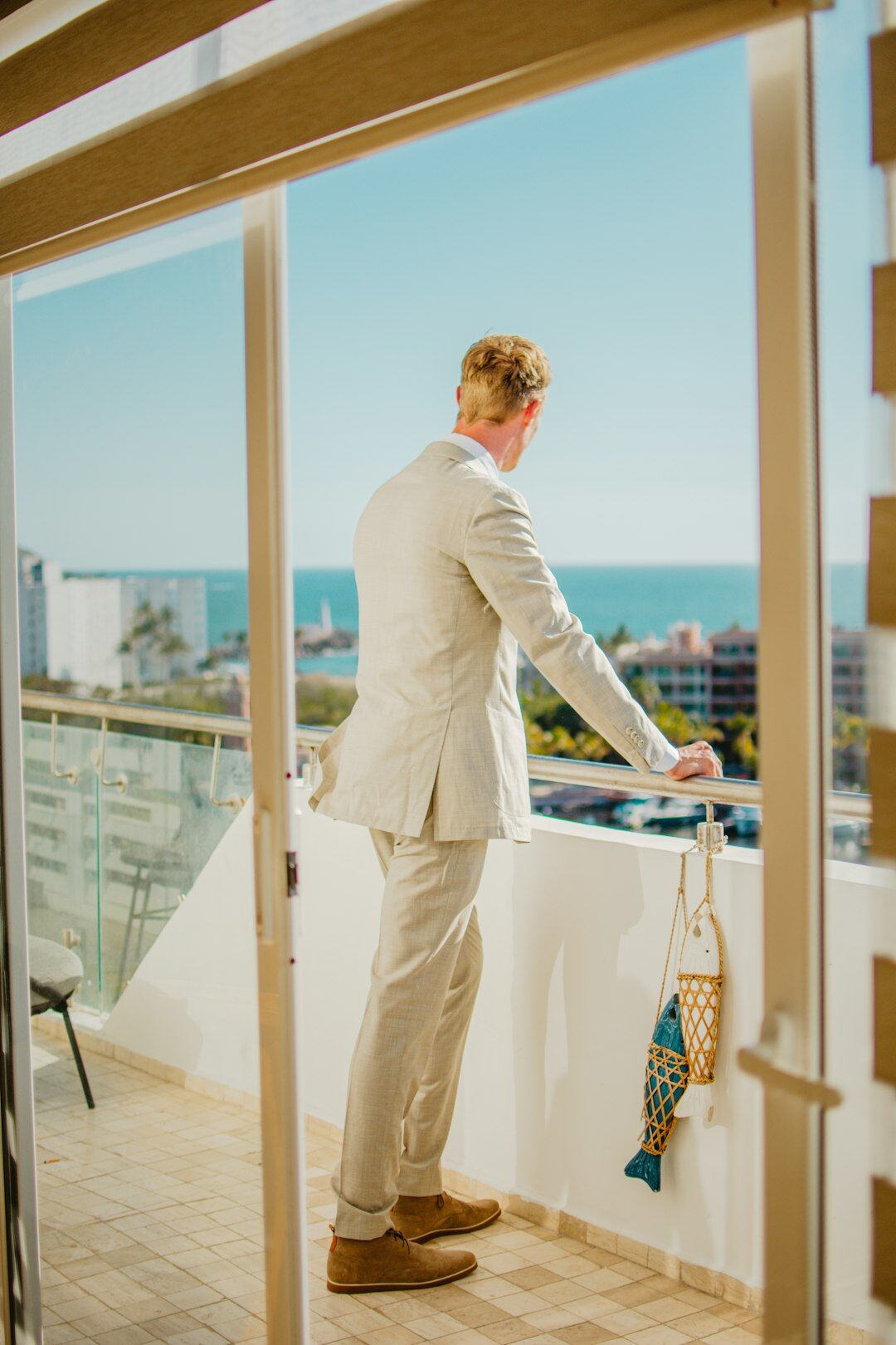 young man on balcony